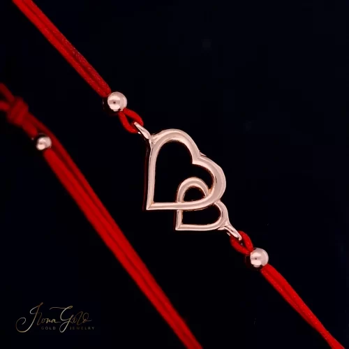 Red thread bracelet with gold details