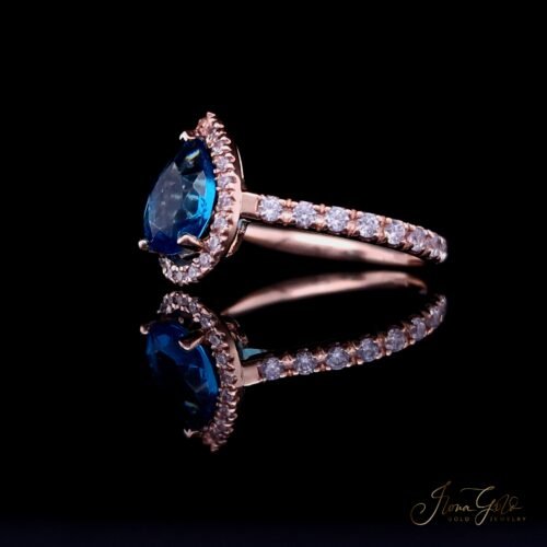 Alternative view of IG Pear-Cut Topaz Halo Zirconia Ring